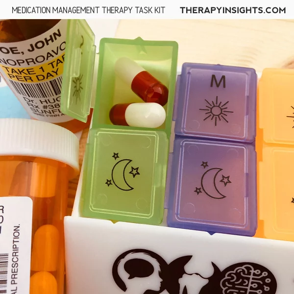 Pills sitting inside medication management kit
